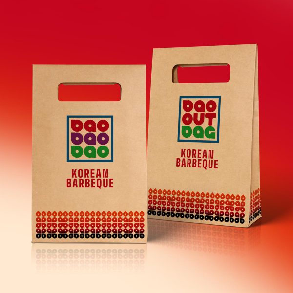 A hi-res mock-up of a branded take-away paper bag created by Design Advocate