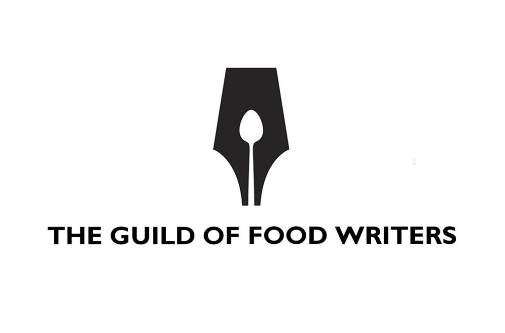 A great design strategy with negative space from the guild of food writers. A nib with the ink reservoir shaped as a spoon.